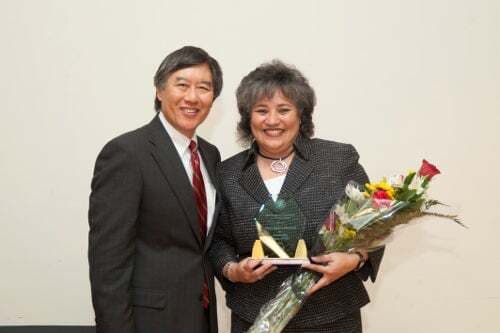 Gloria Aparicio Blackwell, the 2012 award winner for outstanding woman of color with President Loh.