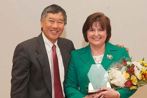 Cynthia Roberts (Cindi) Hale, the 2014 award winner for outstanding woman of the year with President Loh.