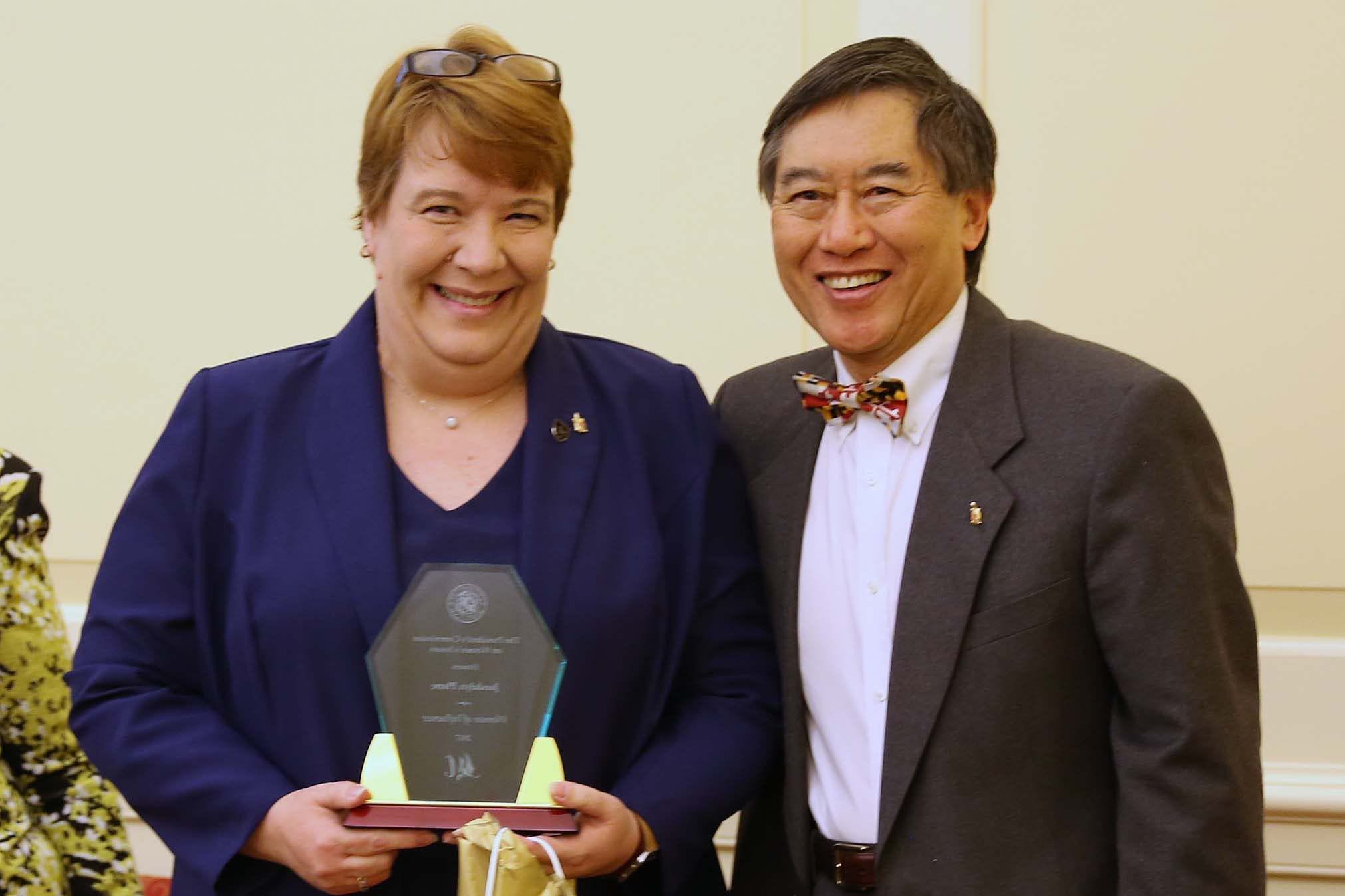 2017 award winner Jandelyn Plane with President Loh