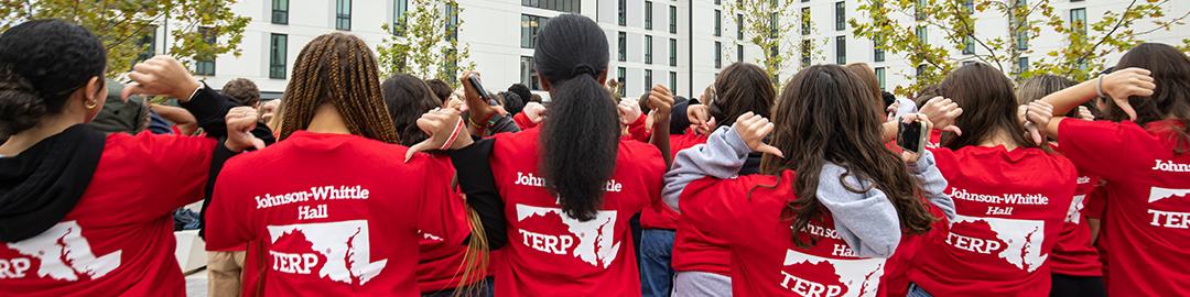 Photograph of students outside of Johnson-Whittle Hall